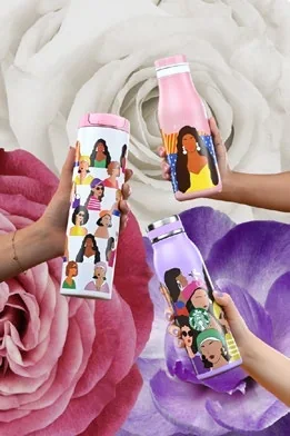 Starbucks International Women's Day bottle resting on purple petals